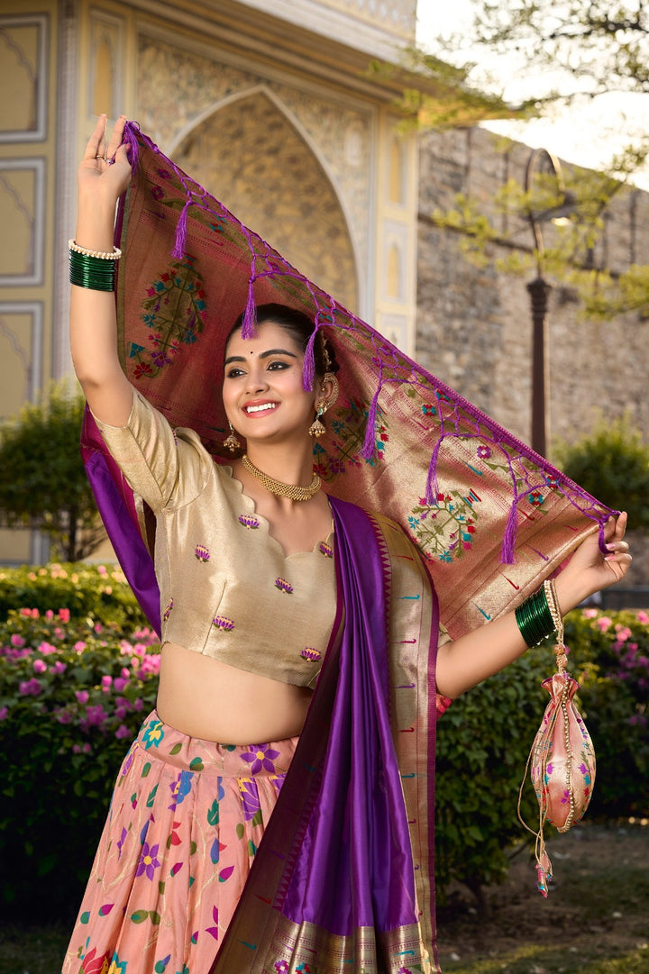 Captivate hearts and turn heads in our Jacquard Silk Paithani Lehenga Choli in Peach Color