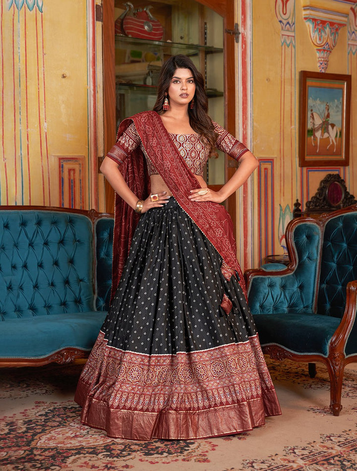 Bandhani And Ajarakh Print With Foil Work Lehenga Choli in Black Color