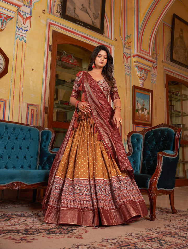 Traditional Indian ethnic wear in dark orange color with bandhani and ajarakh print