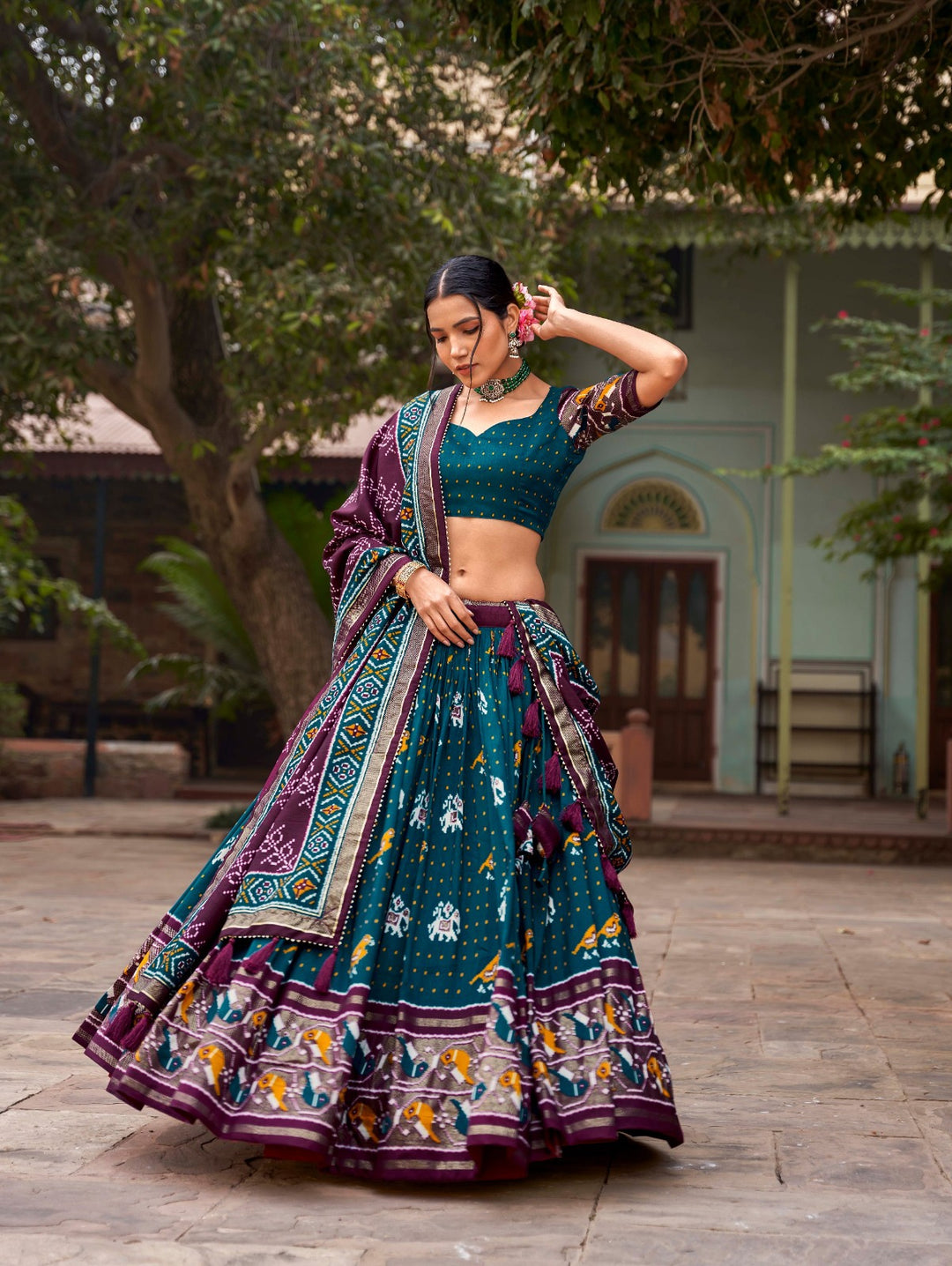 Tussar silk and the mesmerizing allure of ikkat Patola prints lehenga choli in Teal Color