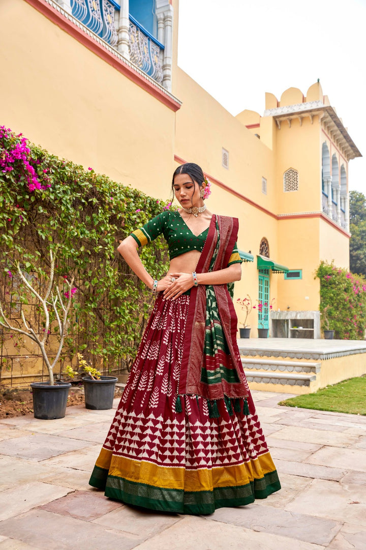 Adorned in printed Tusser silk lehenga choli in Maroon Color