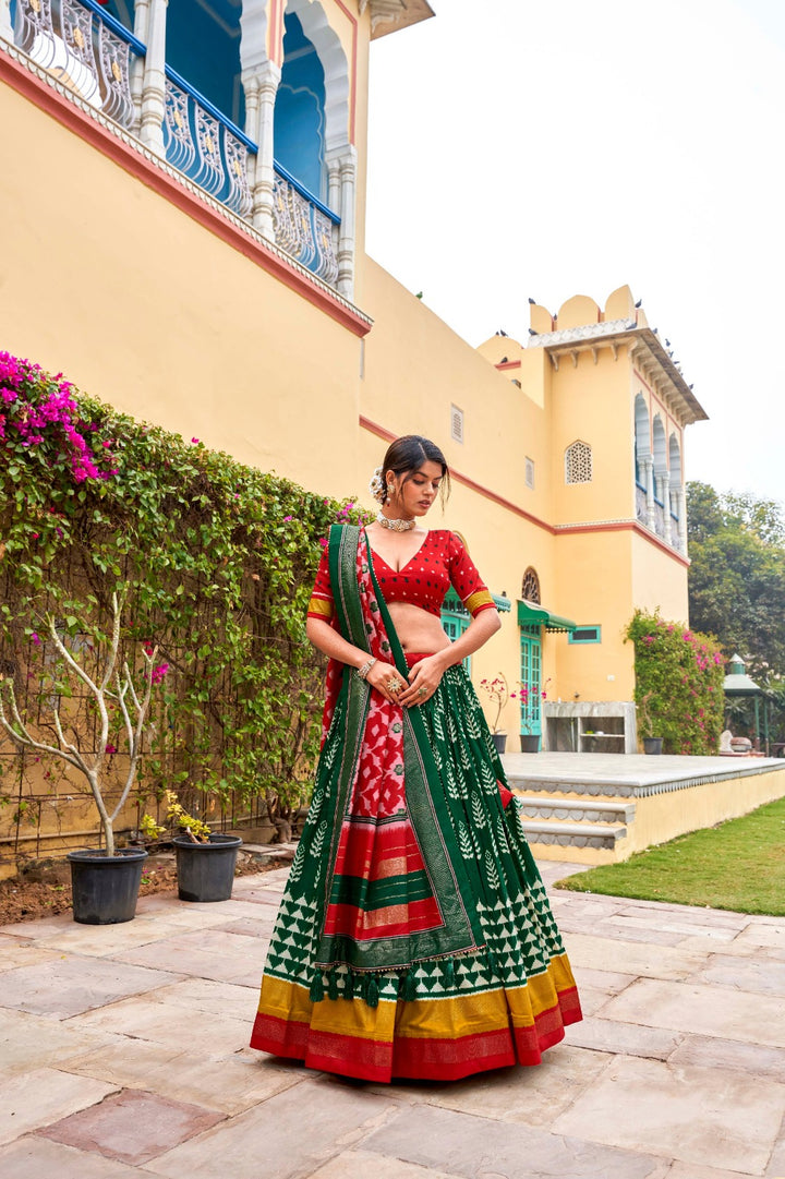 Adorned in printed Tusser silk lehenga choli in Green Color