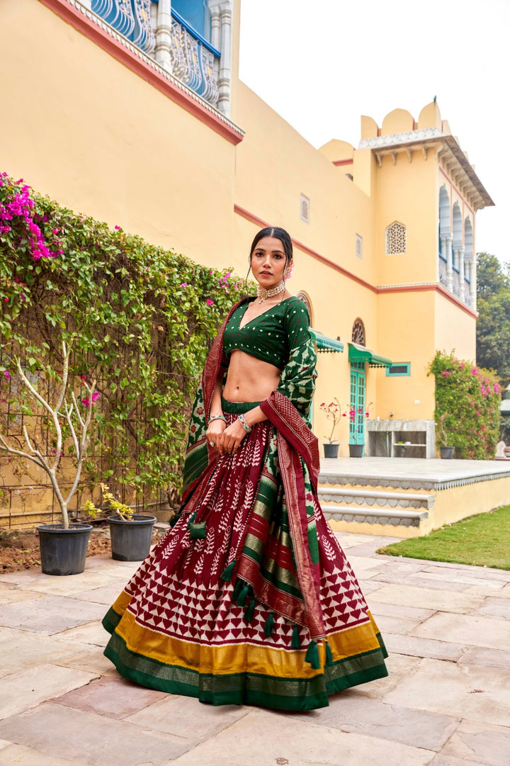 Adorned in printed Tusser silk lehenga choli in Maroon Color