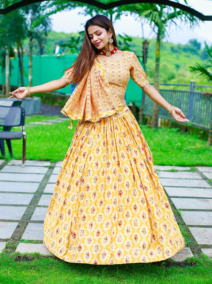 Chanderi Cotton Print with Foil Printed Lace Border Also Come With Tassels Lehenga Choli in Mustard Color