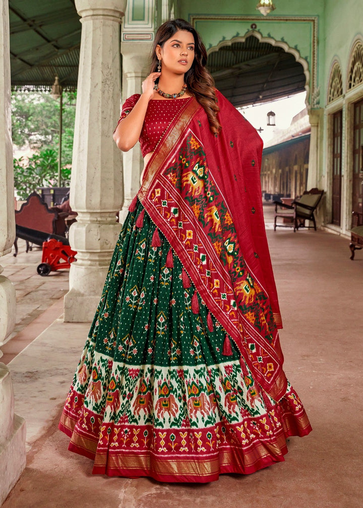 Tussar Silk Patola Print With Foil Work Lehenga Choli In Green Color