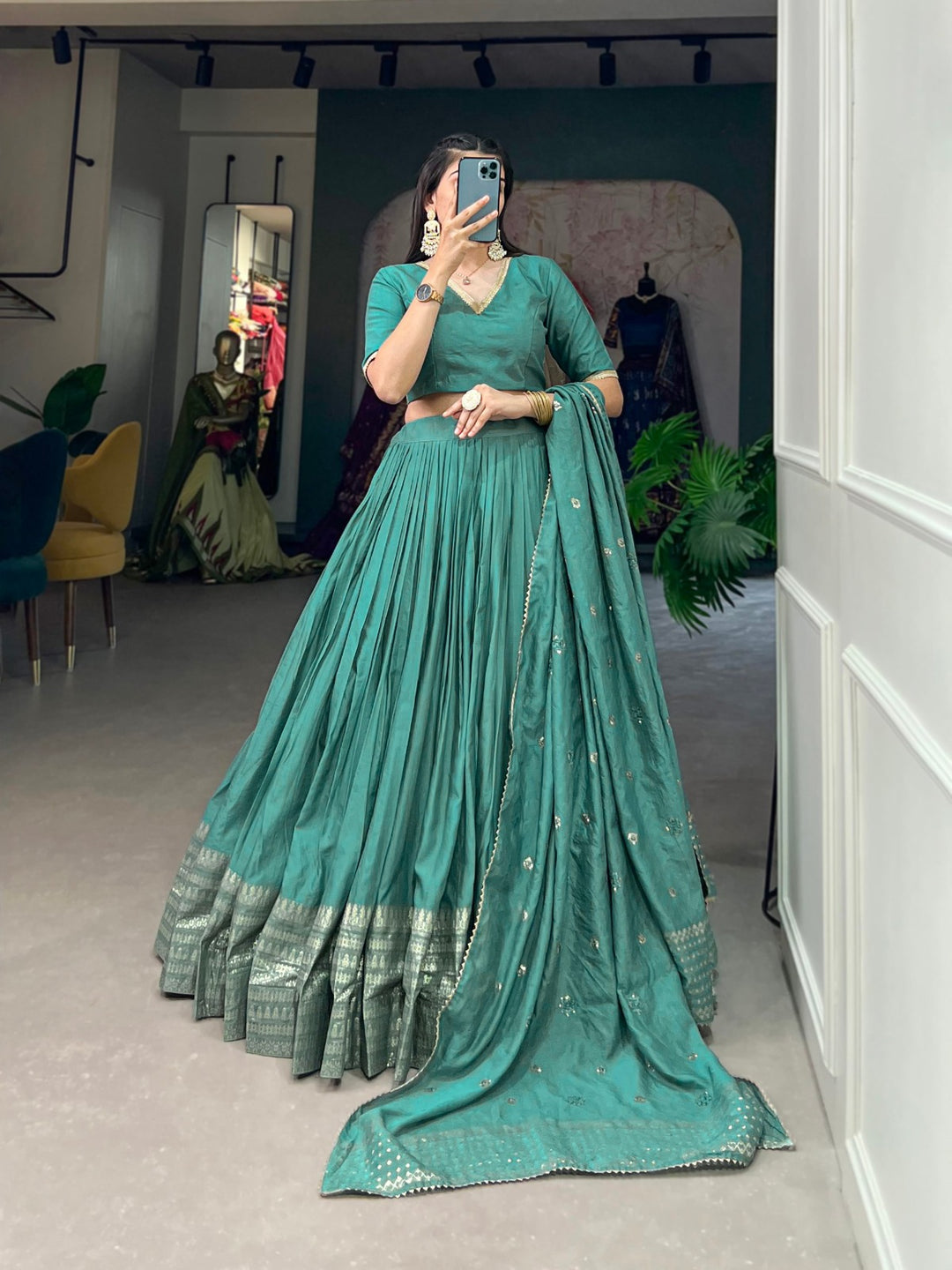 Exquisite sea green Chanderi Lehenga with detailed Zari work border