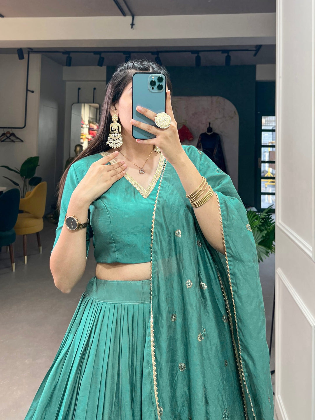 Sea green Chanderi Lehenga adorned with fine Zari work border