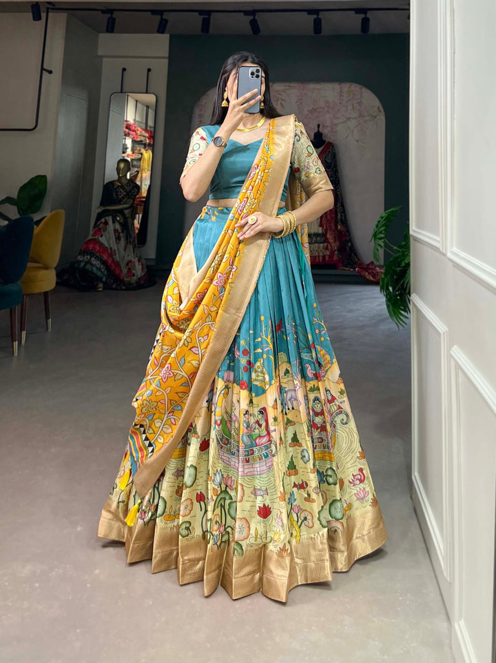 Dola Silk Kalamkari Print With Weaving Border Lehenga Choli In Teal Color