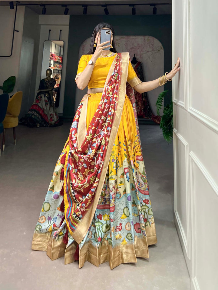 Dola Silk Kalamkari Print With Weaving Border Lehenga Choli In Yellow Color