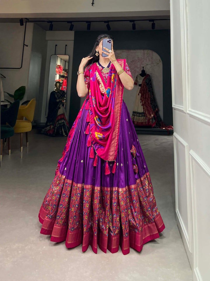 Tussar Silk Print With Foil Work With Heavy Tassels Lehenga Choli In Purple Color