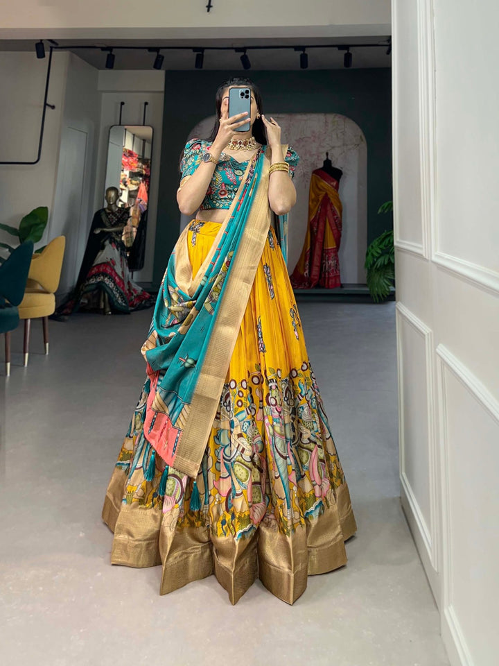 Dola Silk Kalamkari Print With Weaving Border Lehenga Choli in Yellow Color