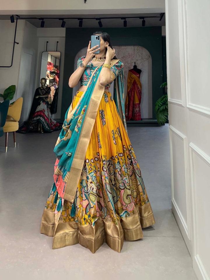 Dola Silk Kalamkari Print With Weaving Border Lehenga Choli in Yellow Color