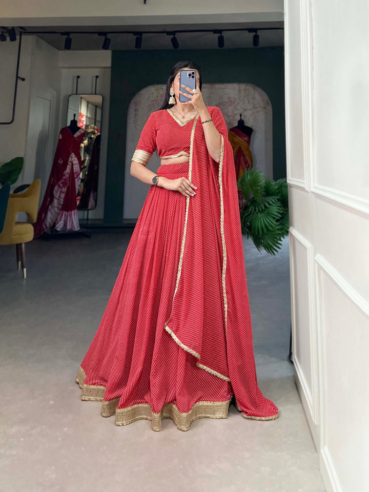 Effortless Charm with Our Dot Print Georgette Lehenga Choli In Red Color