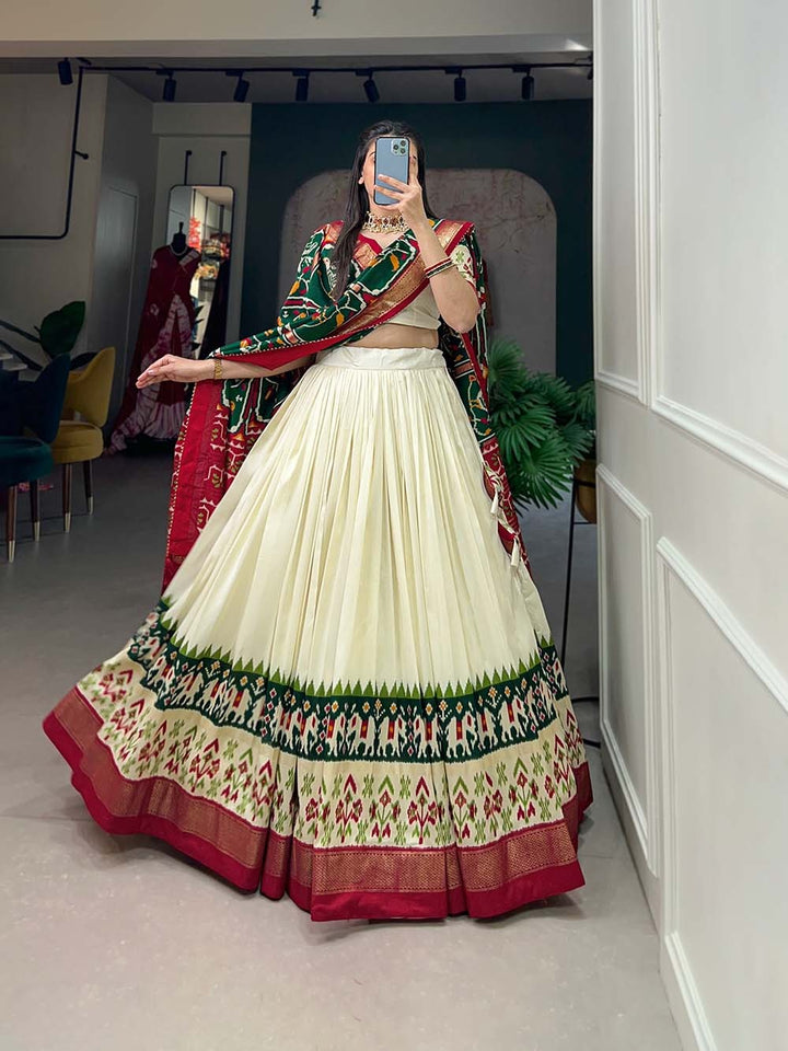 Tussar Silk Patola Print With Foil Printed Silk Lehenga Choli In Green Color