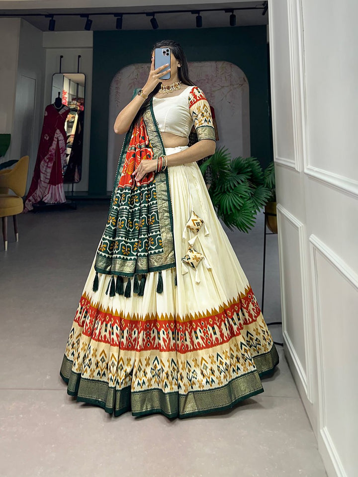 Tussar Silk Patola Print With Foil Printed Silk Lehenga Choli In Orange Color