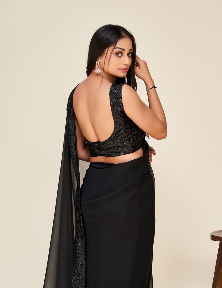 Stunning black Georgette Saree with handcrafted sequins border work