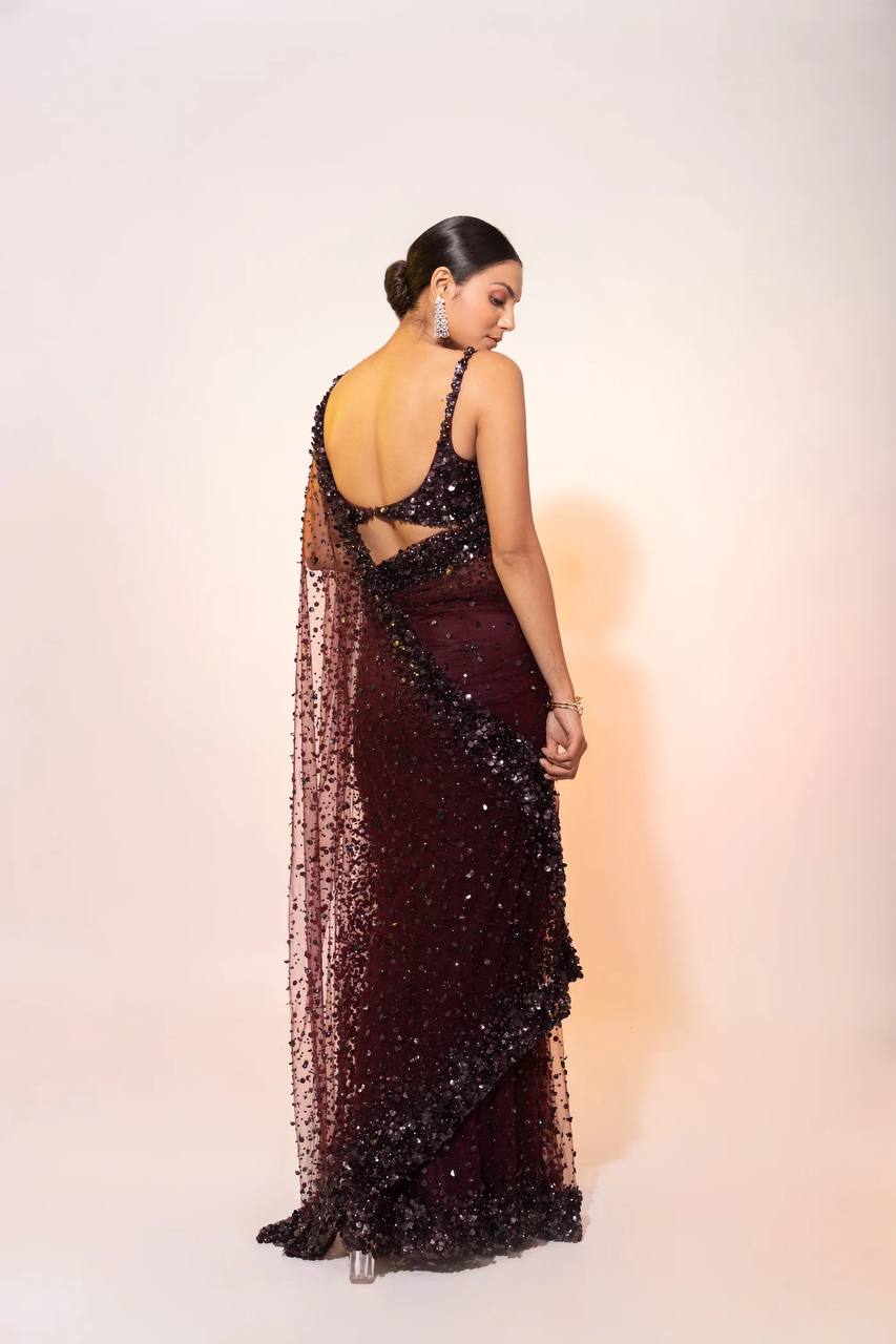 Dark purple net saree with hologram sequin and intricate thread work