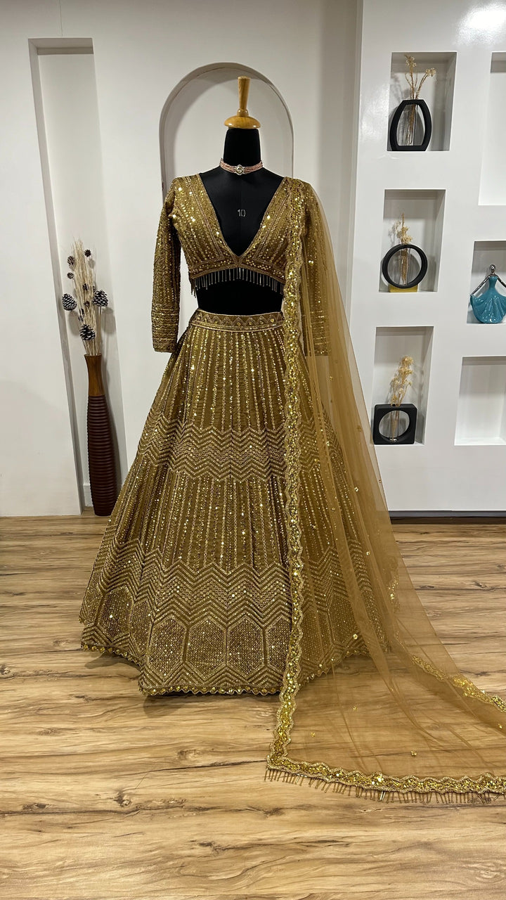 Kasturi Silk Georgette Lehenga with Sequins & Dori Work Lehenga Choli in Golden Color