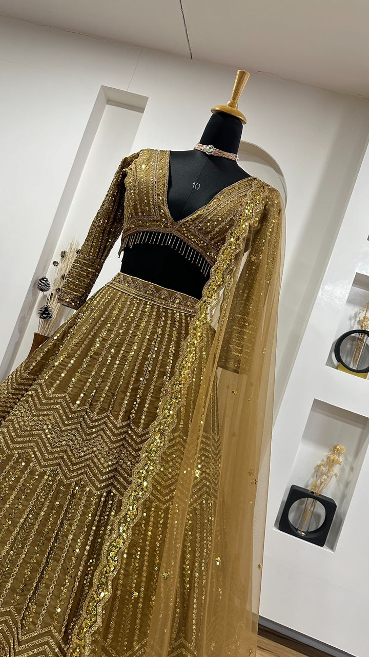 Elegant Lehenga Choli in Golden Color with stunning sequins and dori work