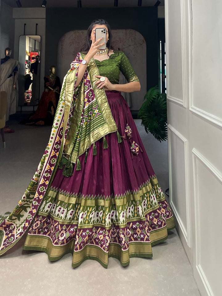 Tussar Silk Patola Print With Foil Work Lehenga Choli In Wine Color