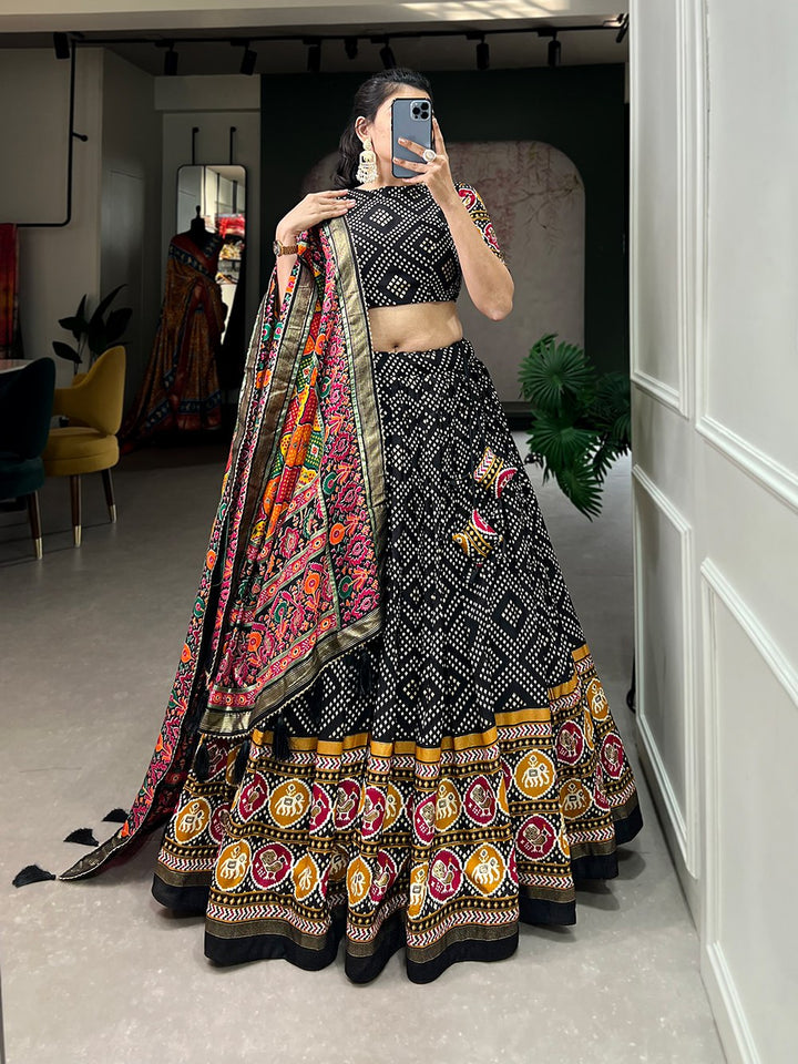 Tussar Silk Bandhej And Patola Print With Foil Work In Black Color