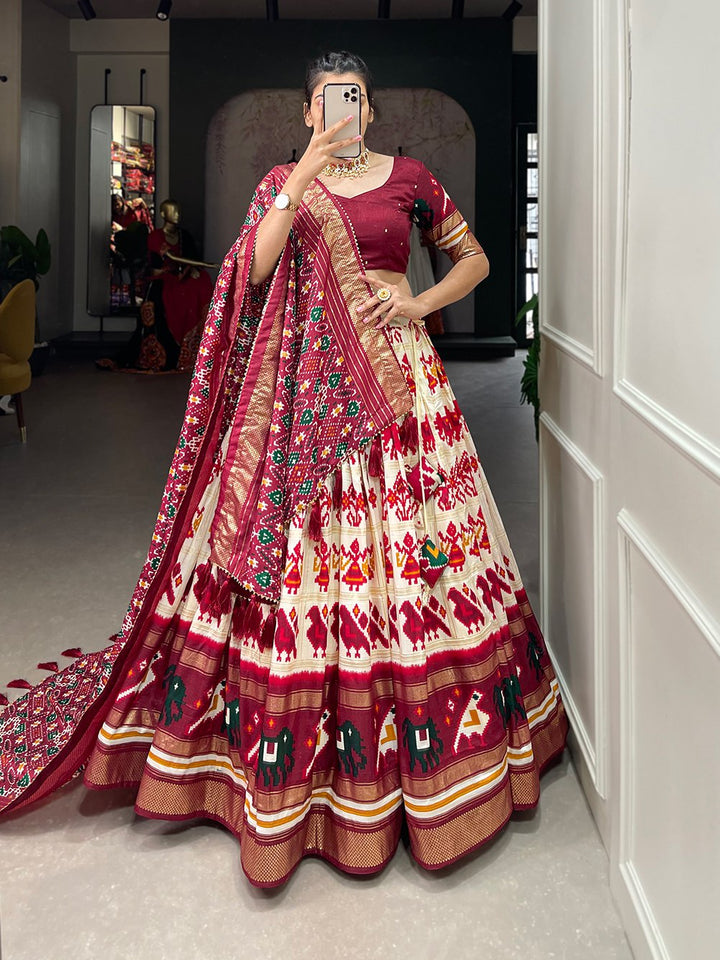 Tussar Silk Patola Print With Foil Work Lehenga Choli In Off White Color