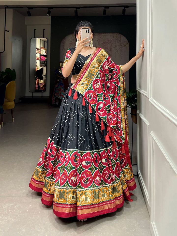 Tussar Silk Patola Print With foil work Lehenga Choli In Black Color