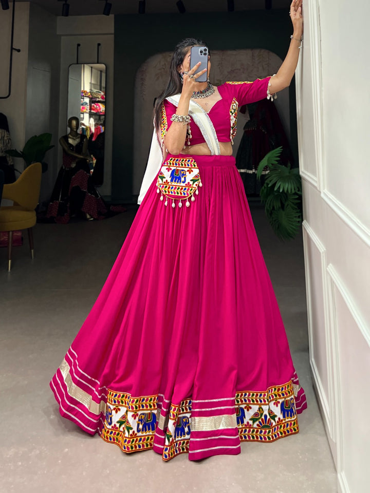 Pink Pure Rayon Plain With Gamthi Work And Gota Patii Lace Border Lehenga Choli displayed on a mannequin for traditional Indian fashion