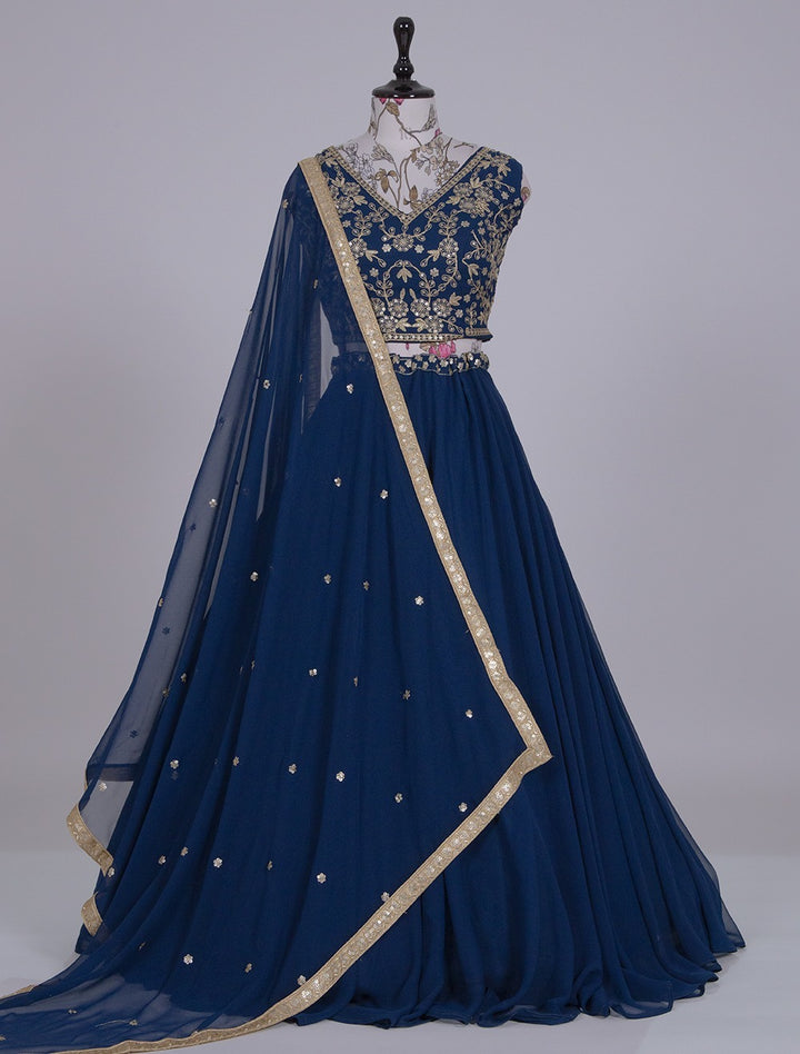 Dark blue georgette dress with intricate sequin and thread embroidery detail 