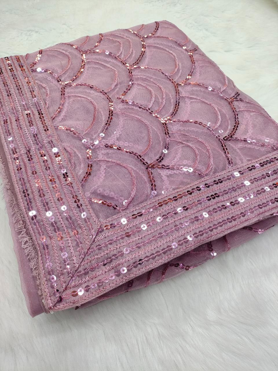 Pink Organza Silk Designr Embroidery work of 5 MM with Zari dori with Embroidered Lace Border.