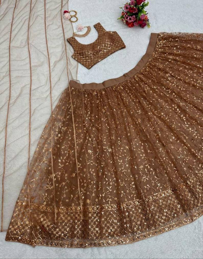 Stunning Golden Color Soft Net Lehenga with traditional and modern fusion style