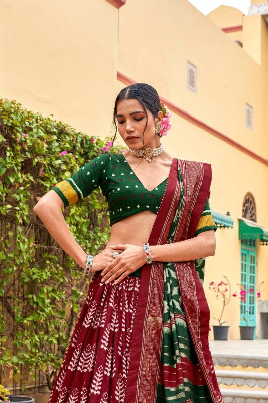 Adorned in printed Tusser silk lehenga choli in Maroon Color