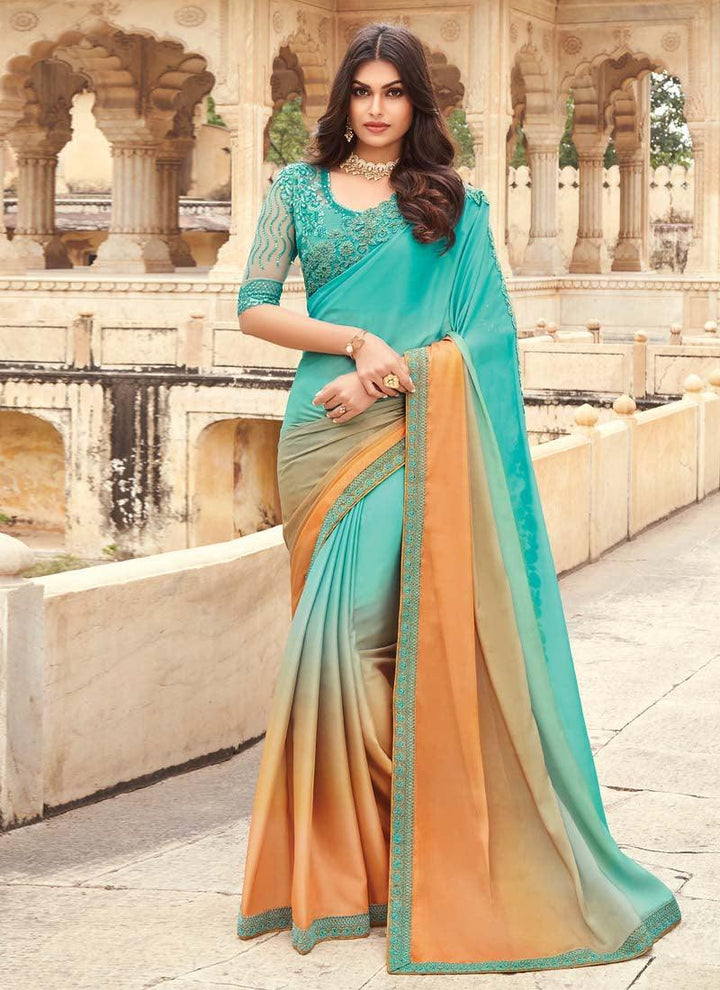 Admirable Sky Blue And Orange Shaded Saree With Heavy Work Designer Blouse  - By Kreeva