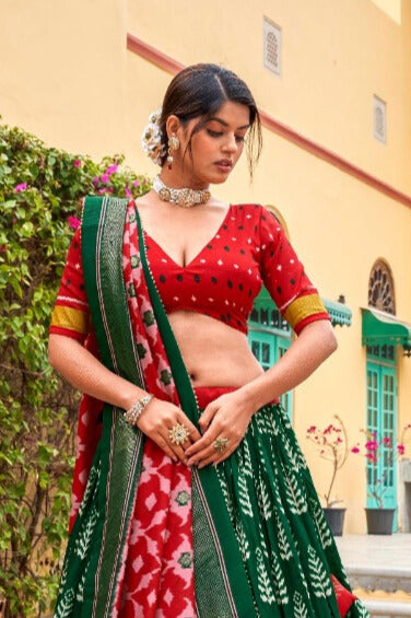 Adorned in printed Tusser silk lehenga choli in Green Color