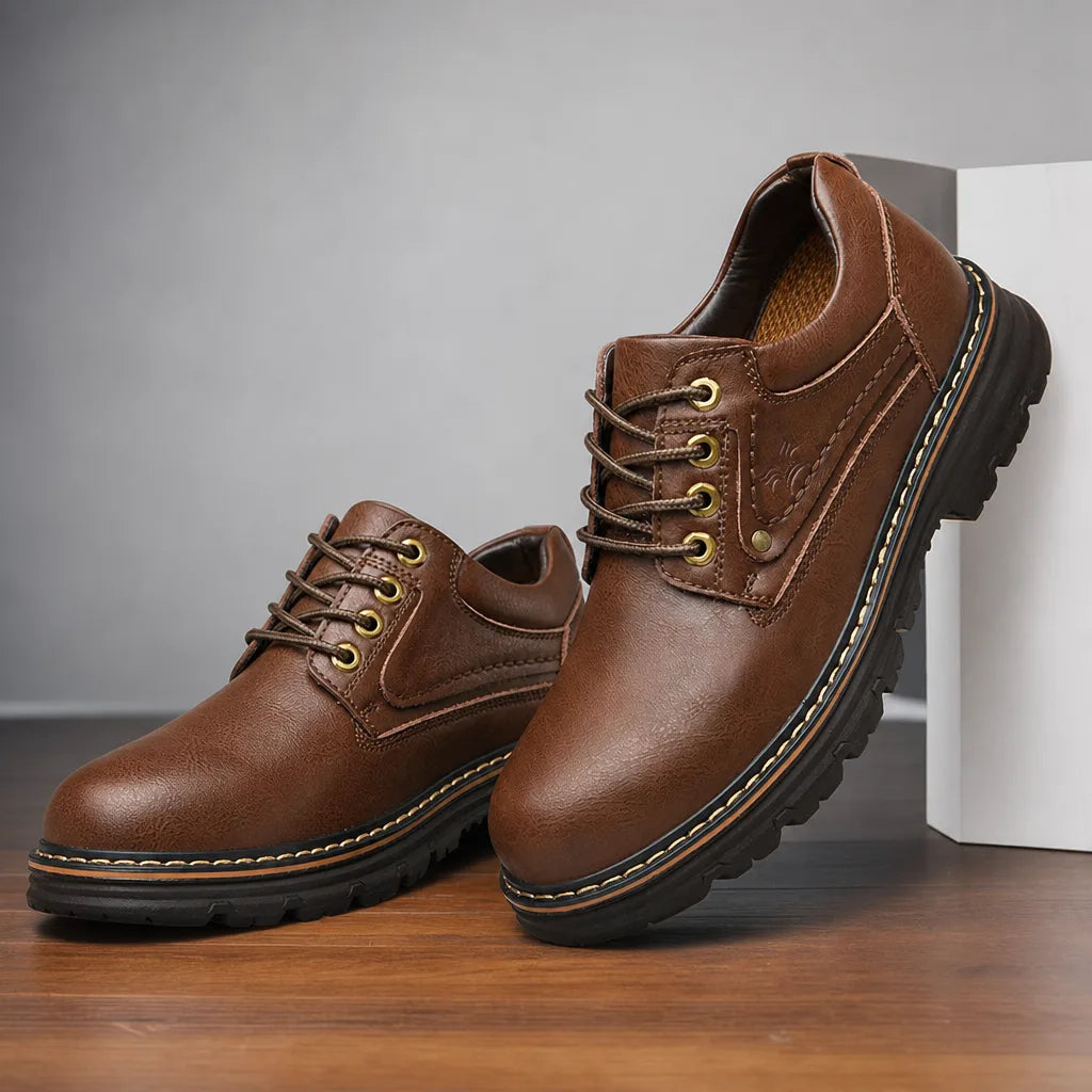 Brown men's leather derbies shoes from Hudson Ridge, styled as Allan by Qivii, showing classic men's footwear with detailed leather finish.