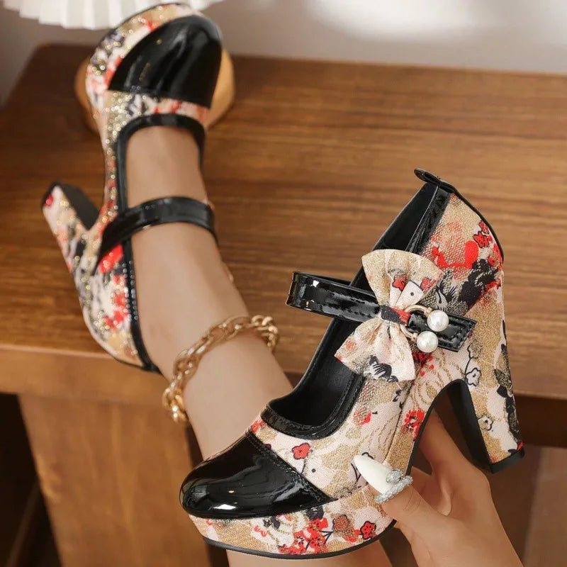 Women's floral Mary Jane platform heels by Hudson Ridge, featuring colorful floral pattern, rounded toe, and chunky heel.
