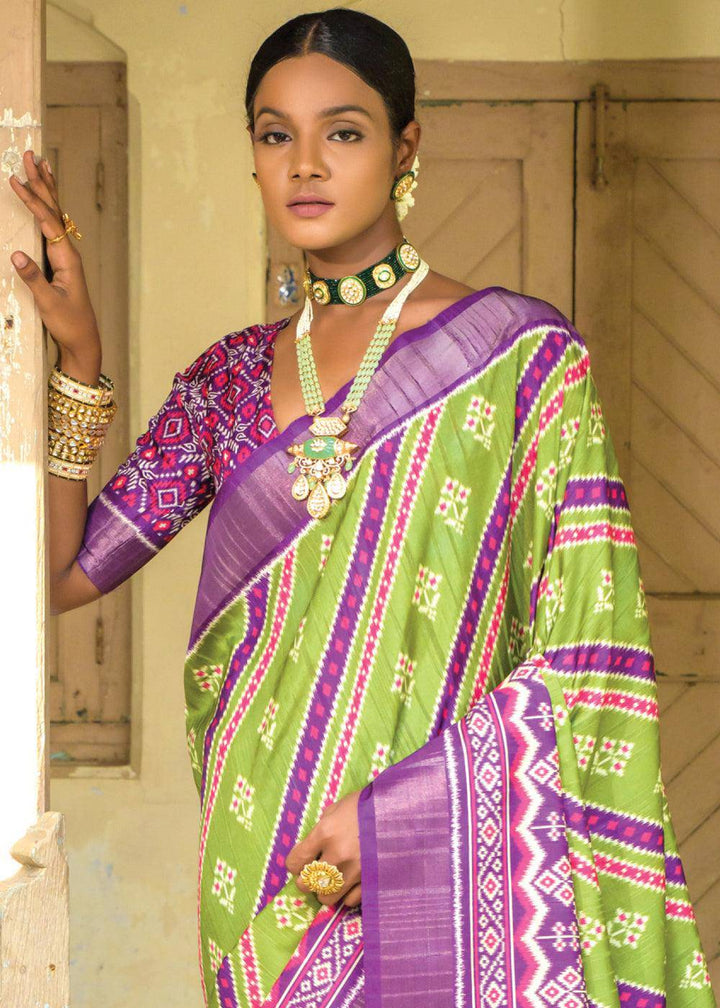 Avocado Green & Purple Patola Printed Dola Silk Saree | Stitched Blouse - qivii