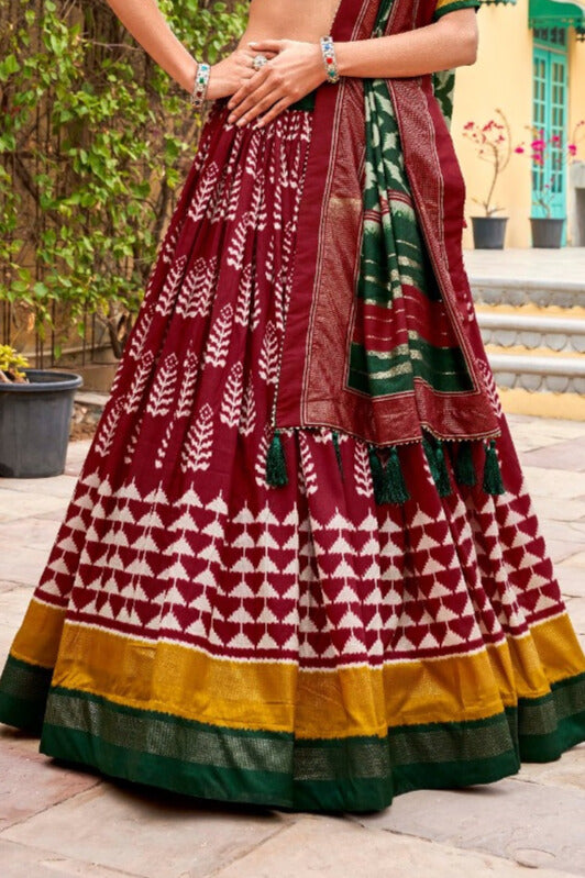 Adorned in printed Tusser silk lehenga choli in Maroon Color