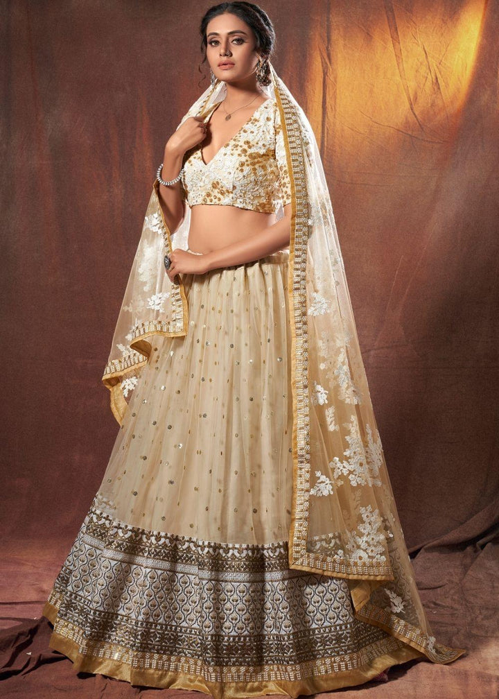 Beige Designer Soft Net Lehenga Choli with Resham, Zari & Sequins work - qivii