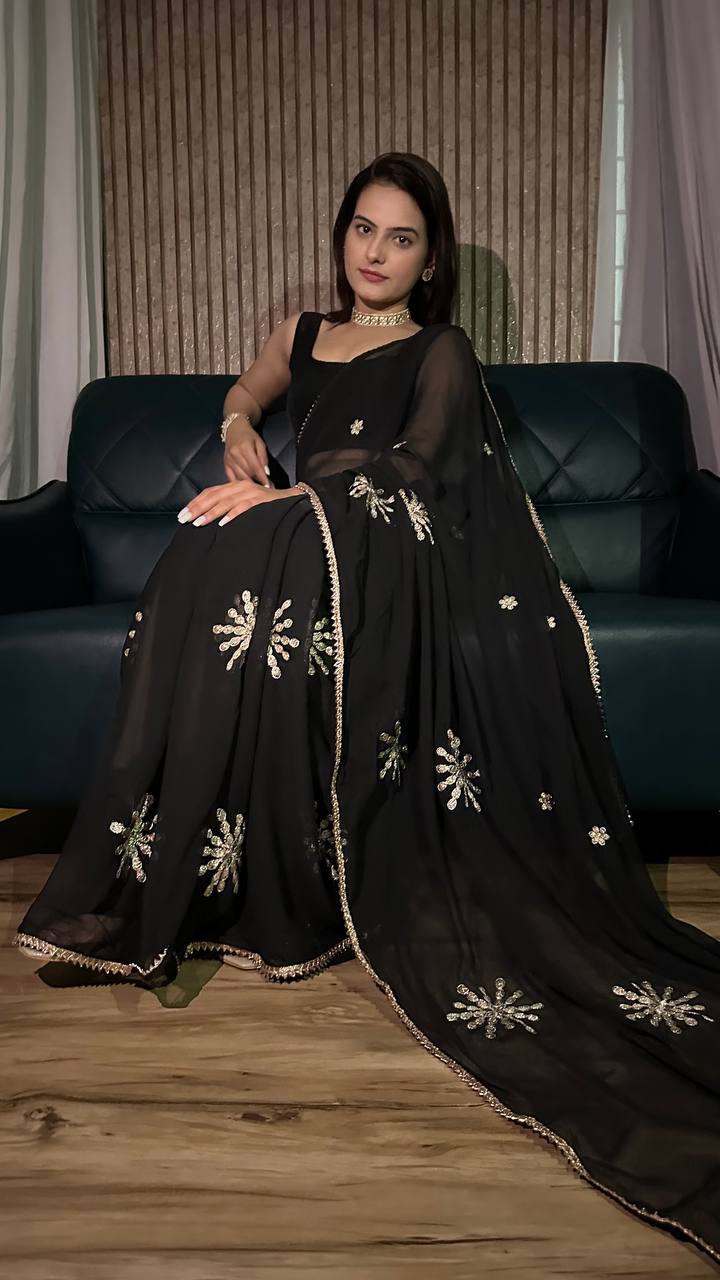 Black Georgette saree with zari embroiderey work & border work