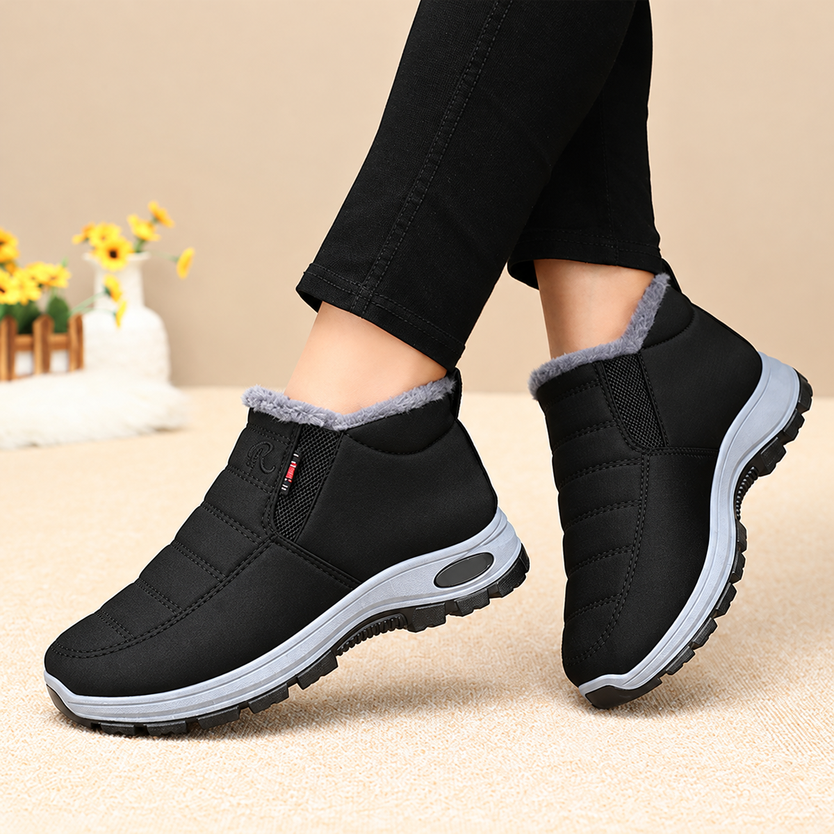 Women's Bootara Lunwick black winter ankle boots with plush lining, side zipper, and cushioned sole, available in US sizes 4-12.5.