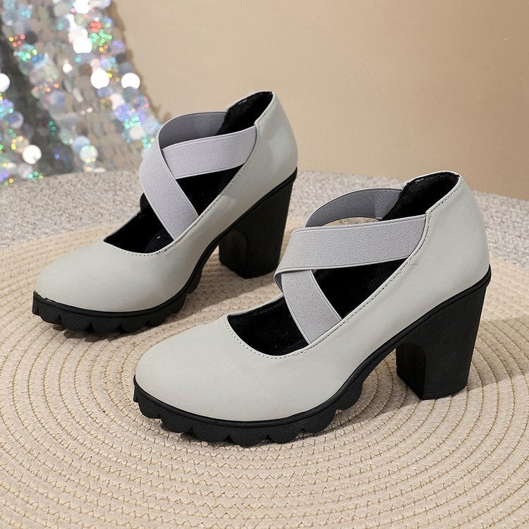 Women's Bootara Ainsley Mary Jane shoes with round toe, cross-strap, chunky lug sole, and block heels in gray.