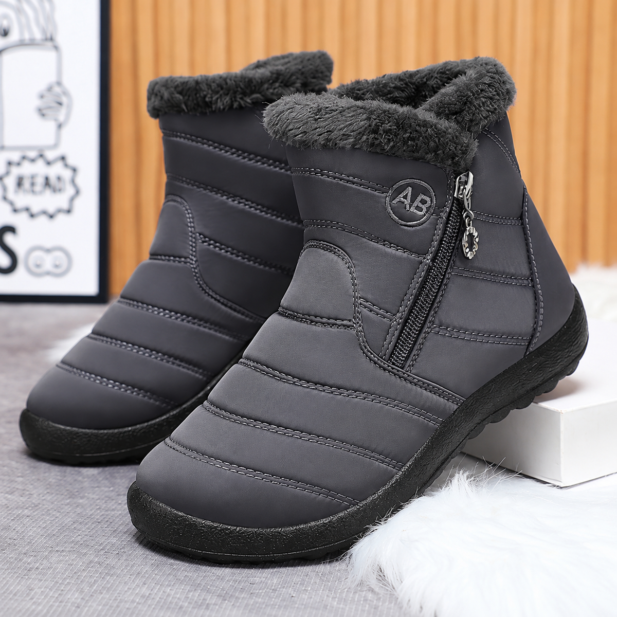 Women's Bootara Norwyn snow boots in gray, water-resistant fleece-lined high-top boots with side zipper for winter warmth and style.