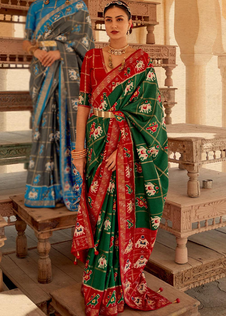 Bottle Green Printed Patola Silk Saree with Zari Border & Tassels on Pallu | Stitched Blouse - qivii