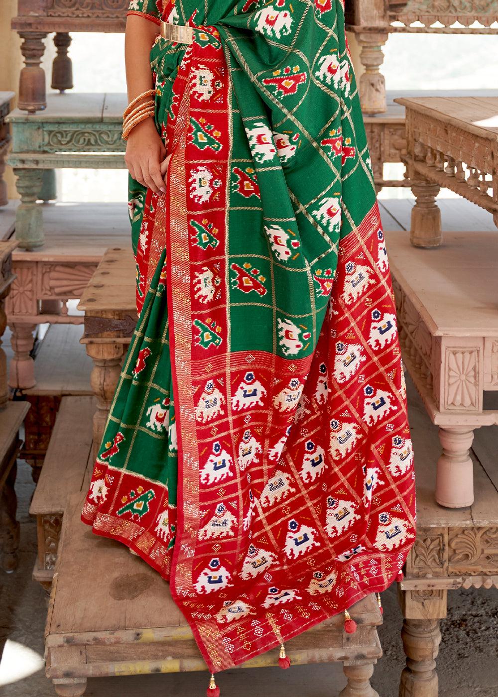 Bottle Green Printed Patola Silk Saree with Zari Border & Tassels on Pallu | Stitched Blouse - qivii