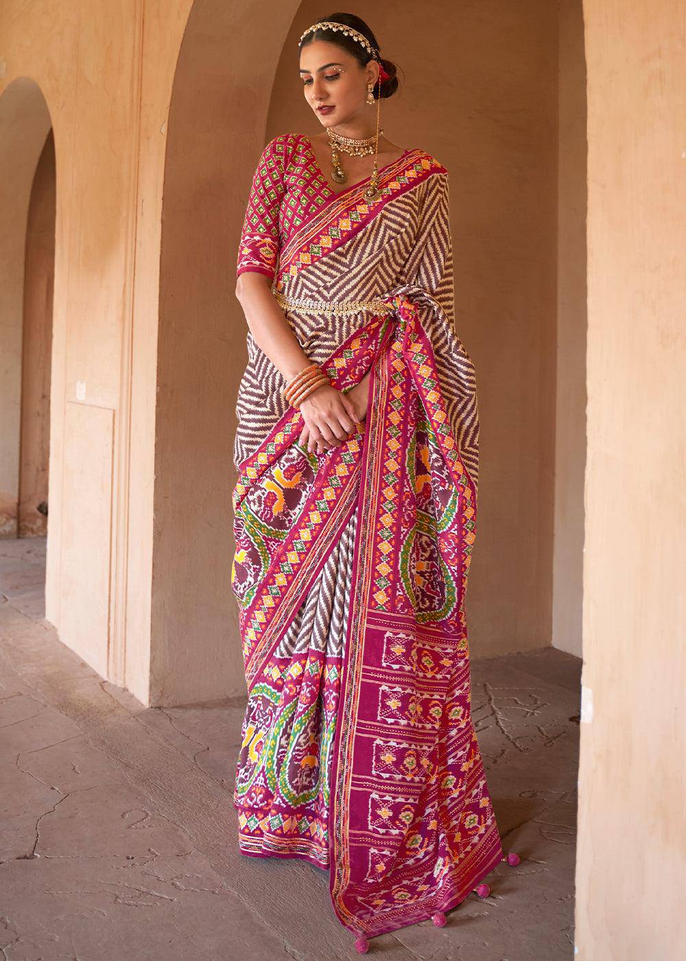 Brown & Pink Printed Patola Silk Saree with Zari Border & Tassels on Pallu | Stitched Blouse - qivii