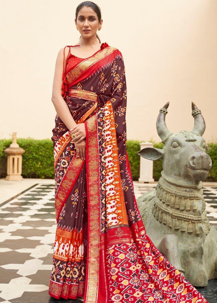 Brown & Red Patola Silk Saree with Zari Border & Tassels On Pallu | Stitched Blouse - qivii