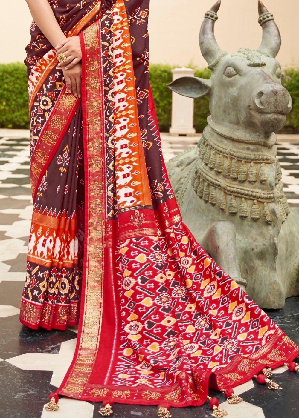 Brown & Red Patola Silk Saree with Zari Border & Tassels On Pallu | Stitched Blouse - qivii