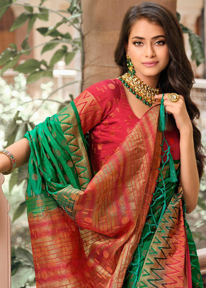 Cadmium Green Zari Butta Woven Raw Banarasi Silk Saree | Stitched Blouse - qivii