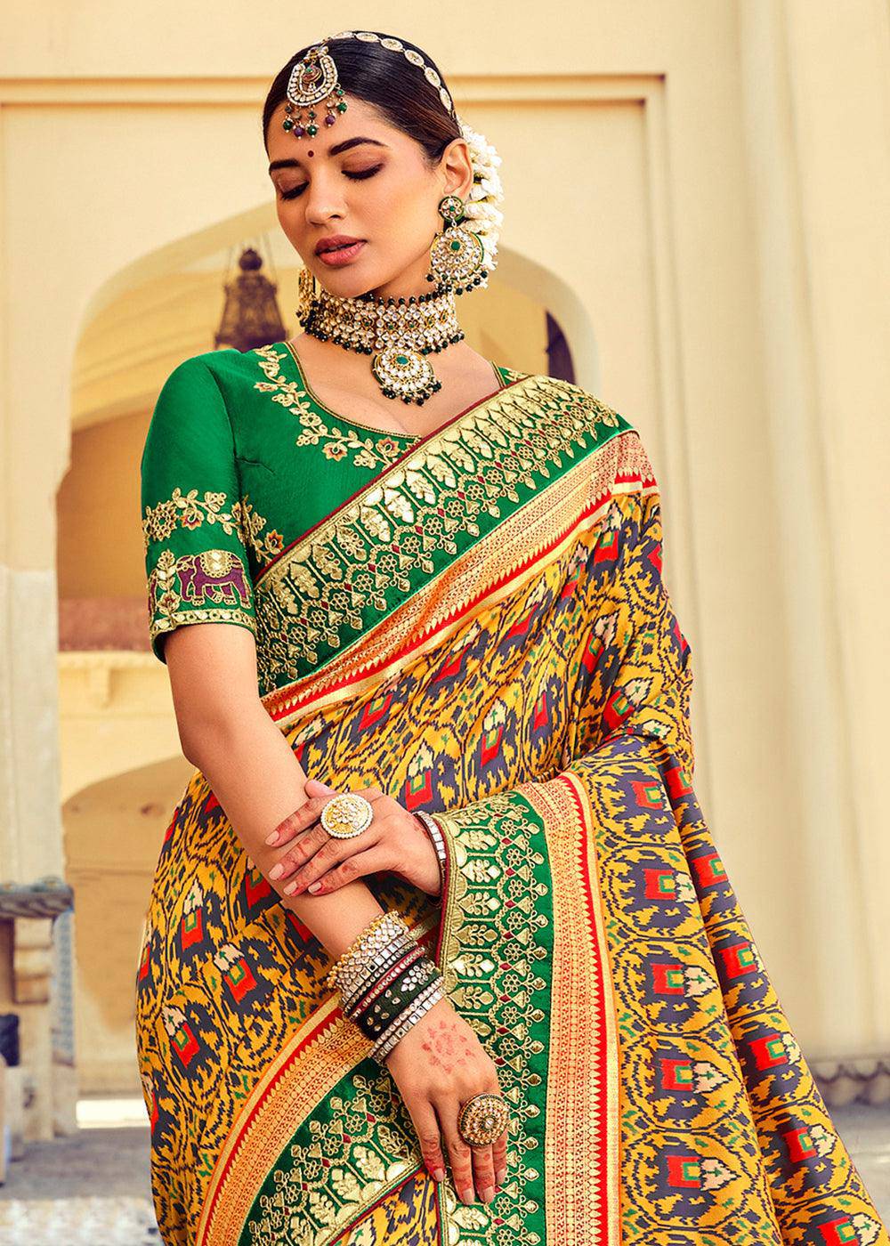 Canary Yellow Patan Patola Silk Saree with Mirror, Khatli & Cut-Dana work | Stitched Blouse - qivii